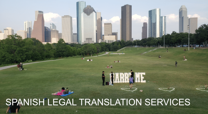 People at Elenor Tinsley Park in Houston setting up a "Marry Me" sign, symbolizing the personal and legal events in this diverse city where Spanish translation services could be needed.